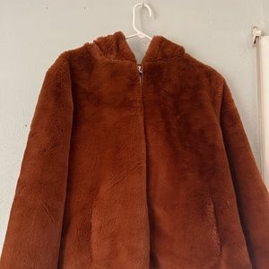 Gently worn faux fur coat…feel extravagant with a conscious